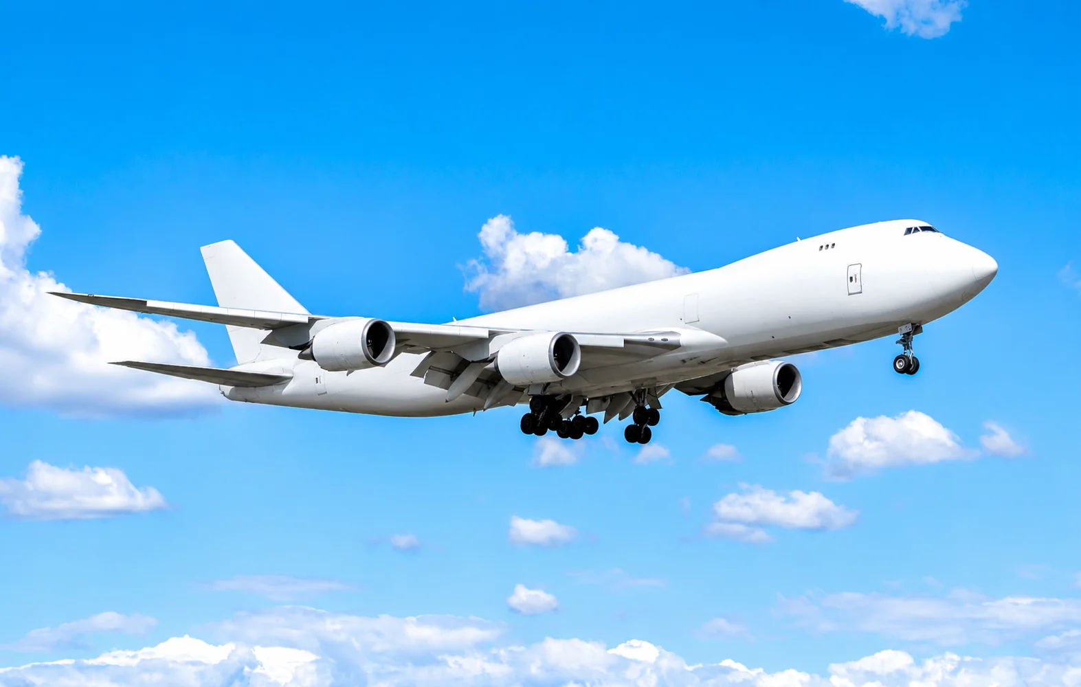 Unbranded cargo aircraft against a blue sky
